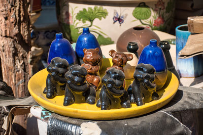 Ccolorful ceramic products with different shapes in the garden of the tao hong tai ceramics factory