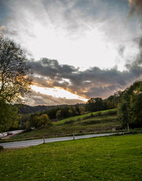 Scenic view of landscape against sky during sunset