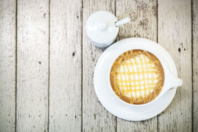 High angle view of coffee on table