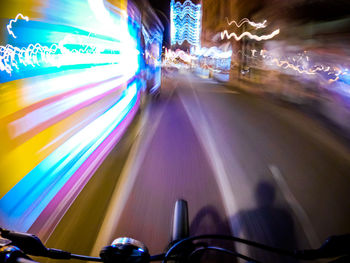 Light trails on road at night