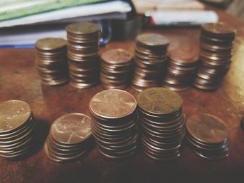 High angle view of coins on table