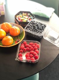 High angle view of fruits in plate on table