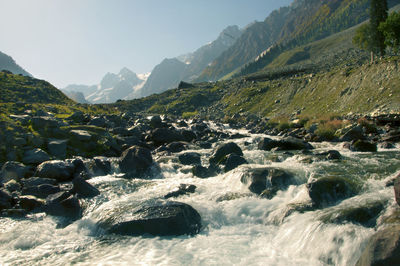 Scenic view of snowcapped mountains against sky