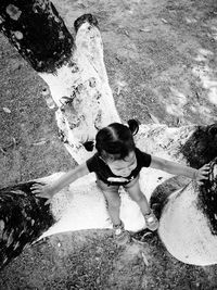 High angle view of young woman on beach