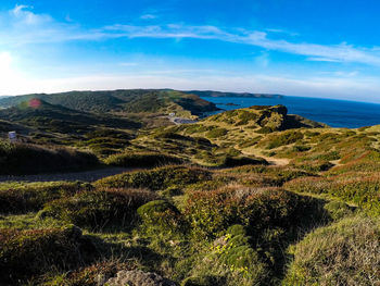 Aerial view of landscape and sea against sky