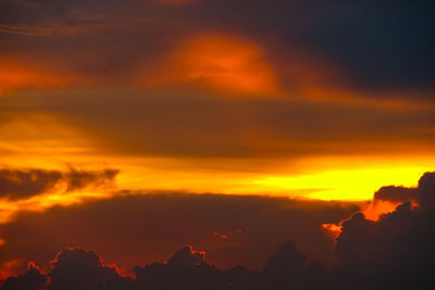 Low angle view of dramatic sky during sunset
