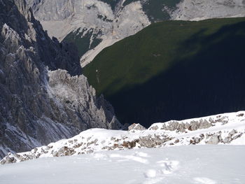 Scenic view of snowcapped mountains during winter