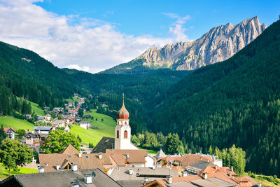 High angle view of townscape by building against sky