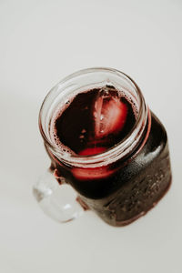 High angle view of glass jar on table