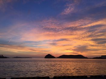 Scenic view of sea at dusk