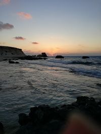 Scenic view of sea against sky during sunset