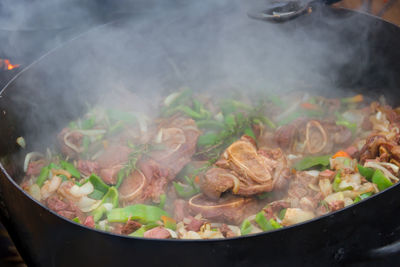 High angle view of meat in cooking pan