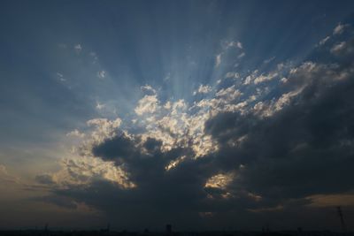 Low angle view of cloudy sky at sunset