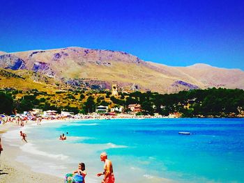 Tourists enjoying at beach