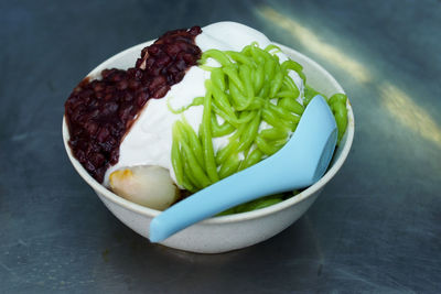 Close-up of salad in bowl on table