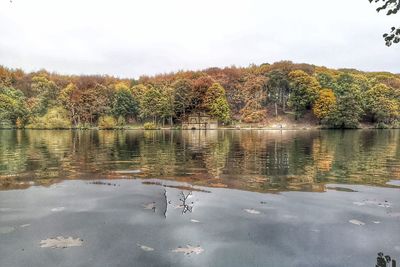 Scenic view of lake against sky during autumn