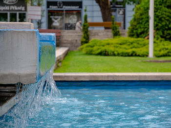 Close-up of water fountain in swimming pool