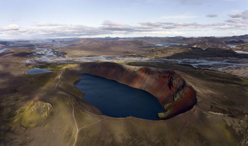 Crater lake in hilly terrain