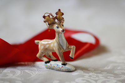 Close-up of figurine on table
