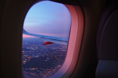 View of cityscape through airplane window