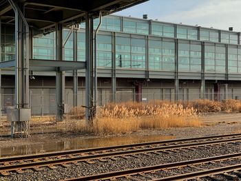 Train on railroad station platform against sky