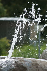 Water splashing on rock