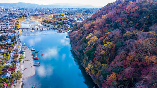 High angle view of river amidst buildings in city