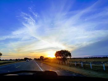 Road against sky during sunset