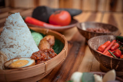 Close-up of fruits in bowl on table