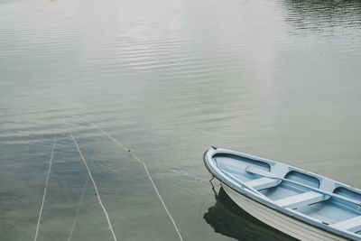 High angle view of boat moored in lake