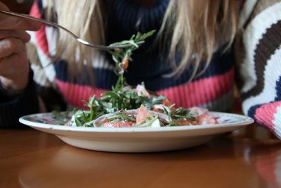 Close-up of salad in plate on table