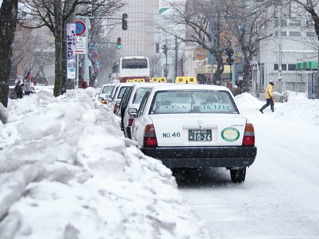 SNOW ON CITY STREET