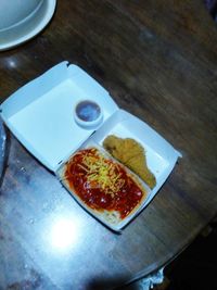 High angle view of breakfast in plate on table