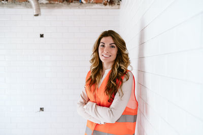 Inspector or architect professional woman checking kitchen at construction site. home improvement