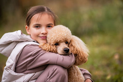 Portrait of woman with dog