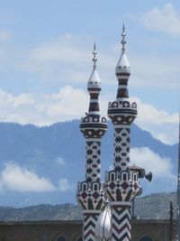 Built structure against cloudy sky