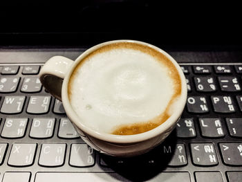 Coffee cup on table