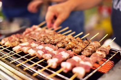 Close-up of meat on barbecue grill