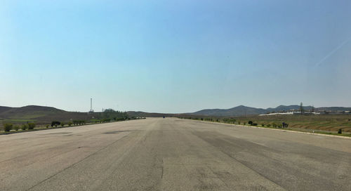 View of empty road against clear sky