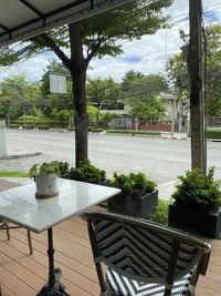 Chairs and table against trees in yard