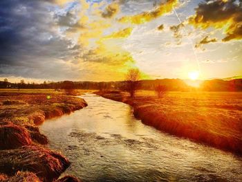 Scenic view of sunset over landscape