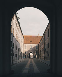 Alley amidst buildings in city