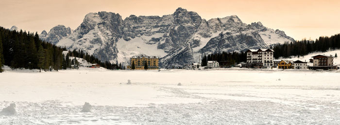 Scenic view of snowcapped mountains against sky during winter