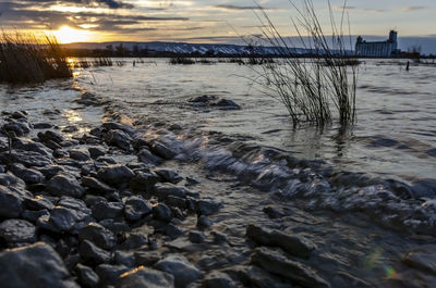 Scenic view of sea against sky during sunset