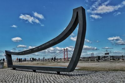 Panoramic view of people against sky