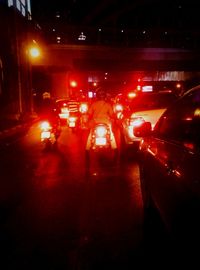 Cars on road at night