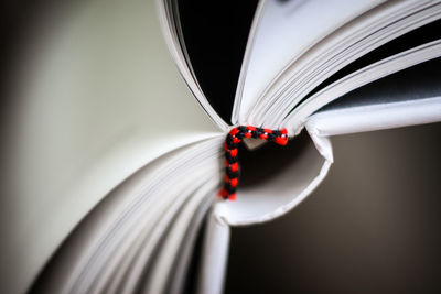 A beautiful close up of a book in dark red cover