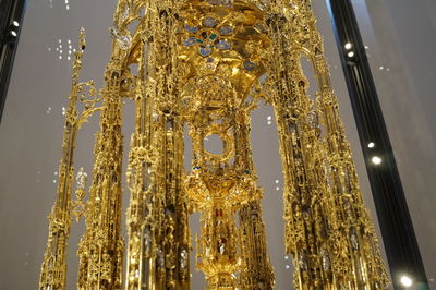 Low angle view of illuminated lighting equipment