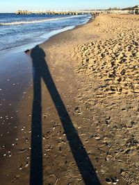 Shadow of man on beach