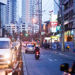 Traffic on road in city at night